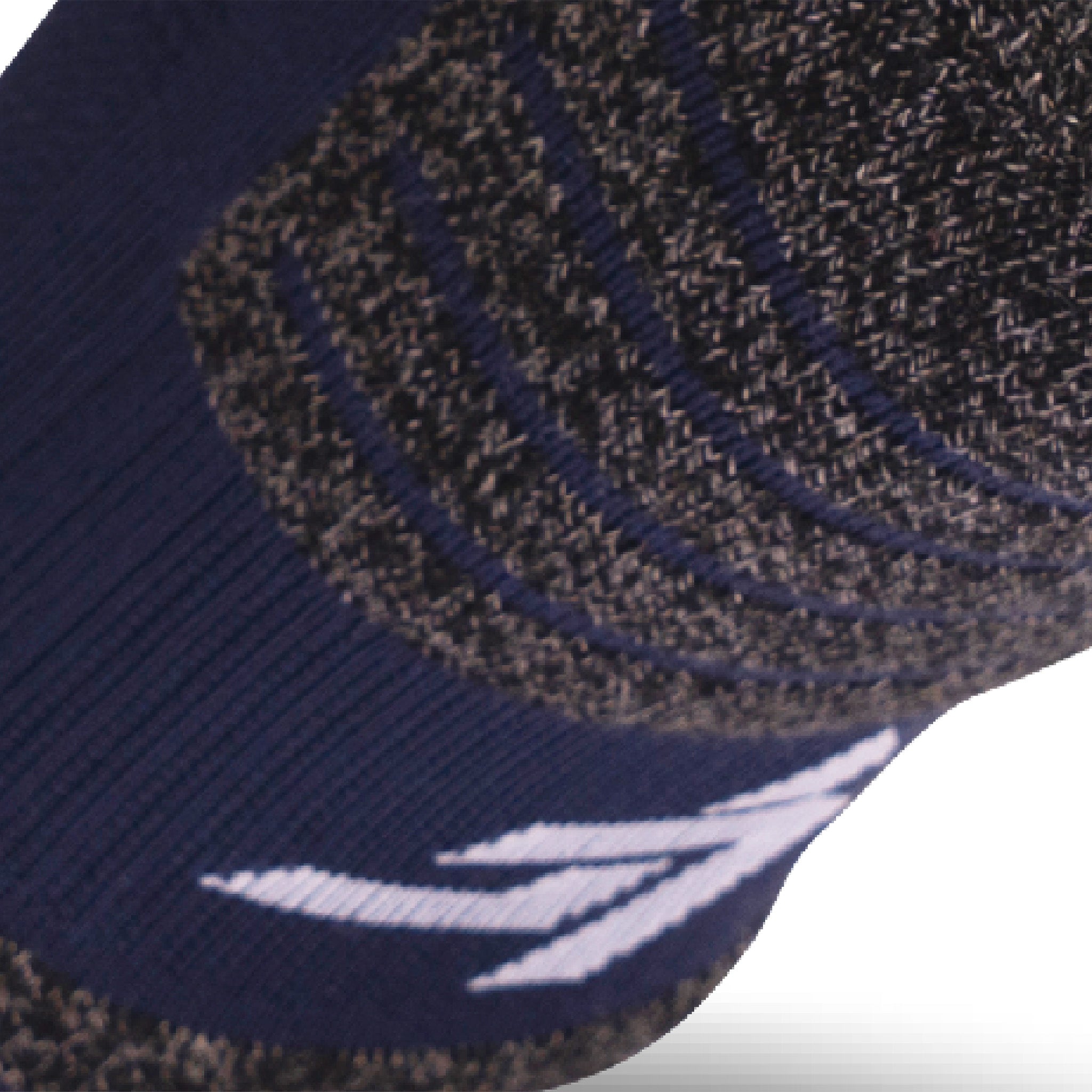 Close up view of elastic arch of Lightfeet Performance Navy Ankle Sock