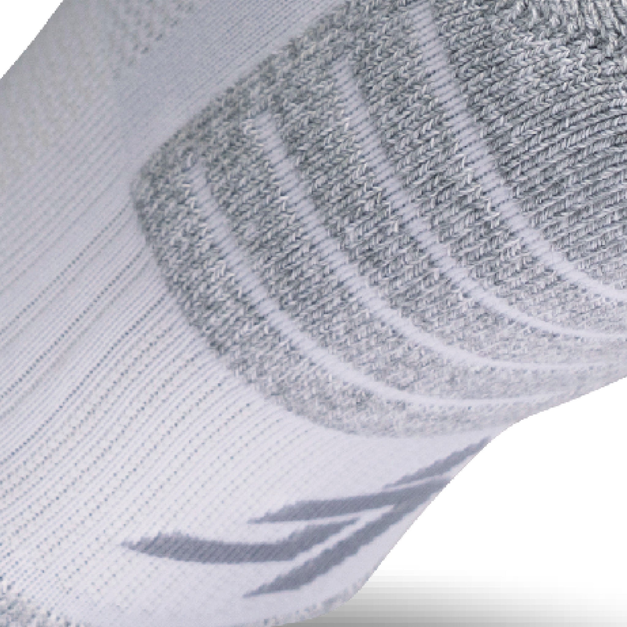 Close up view of elastic arch of Lightfeet Performance White Ankle Sock