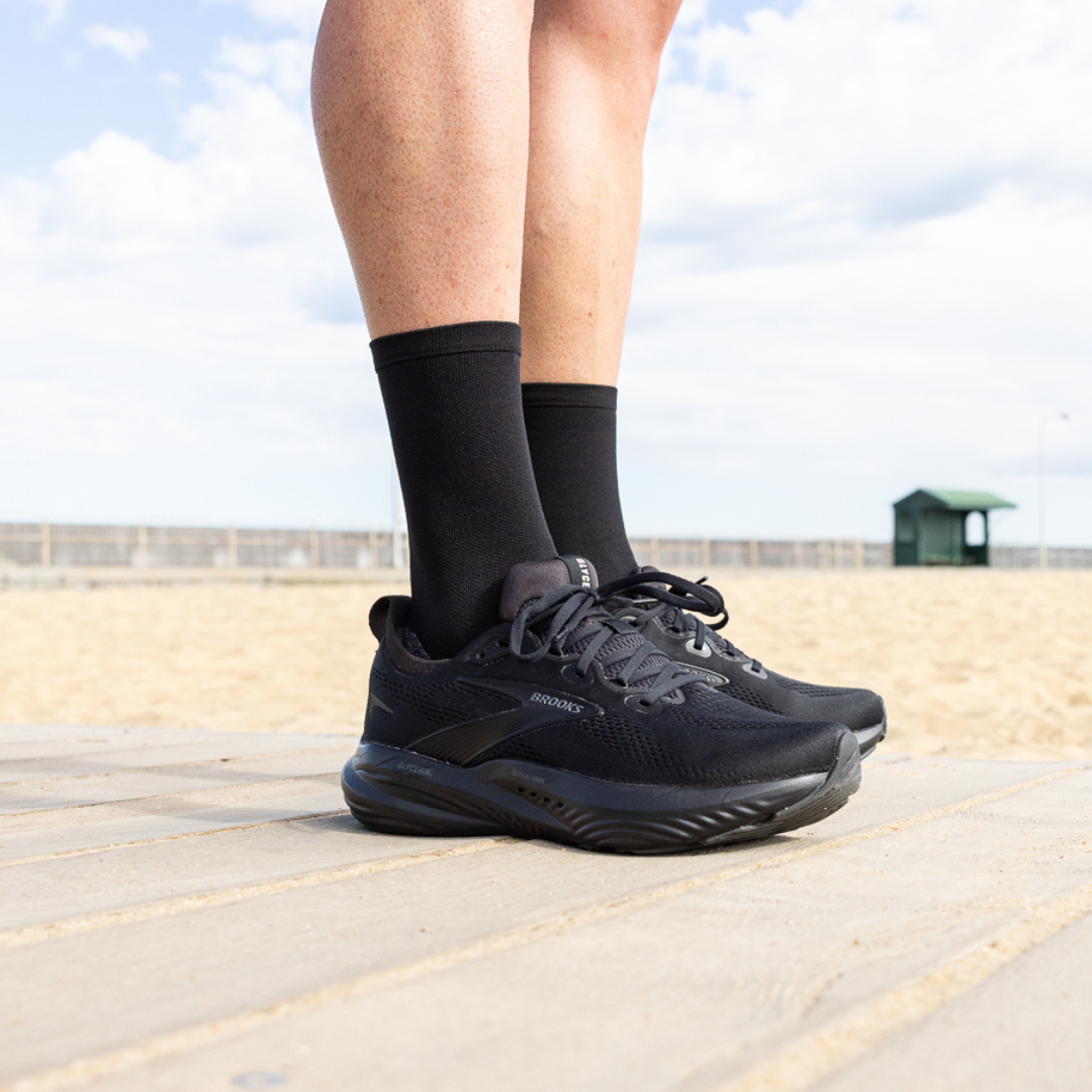 Person wearing Lightfeet Performance Black Half Crew Sock