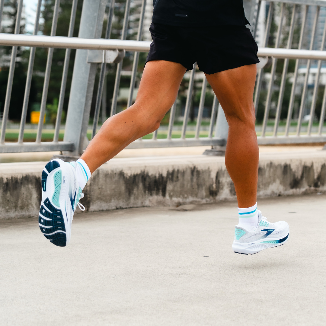 Image of person wearing Lightfeet Performance 2 Stripes White Blue Glacier Quarter Socks 