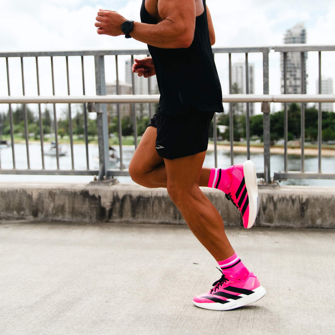 Image of person wearing Lightfeet Performance 2 Stripes Pink White Black_x0010_Quarter Socks 