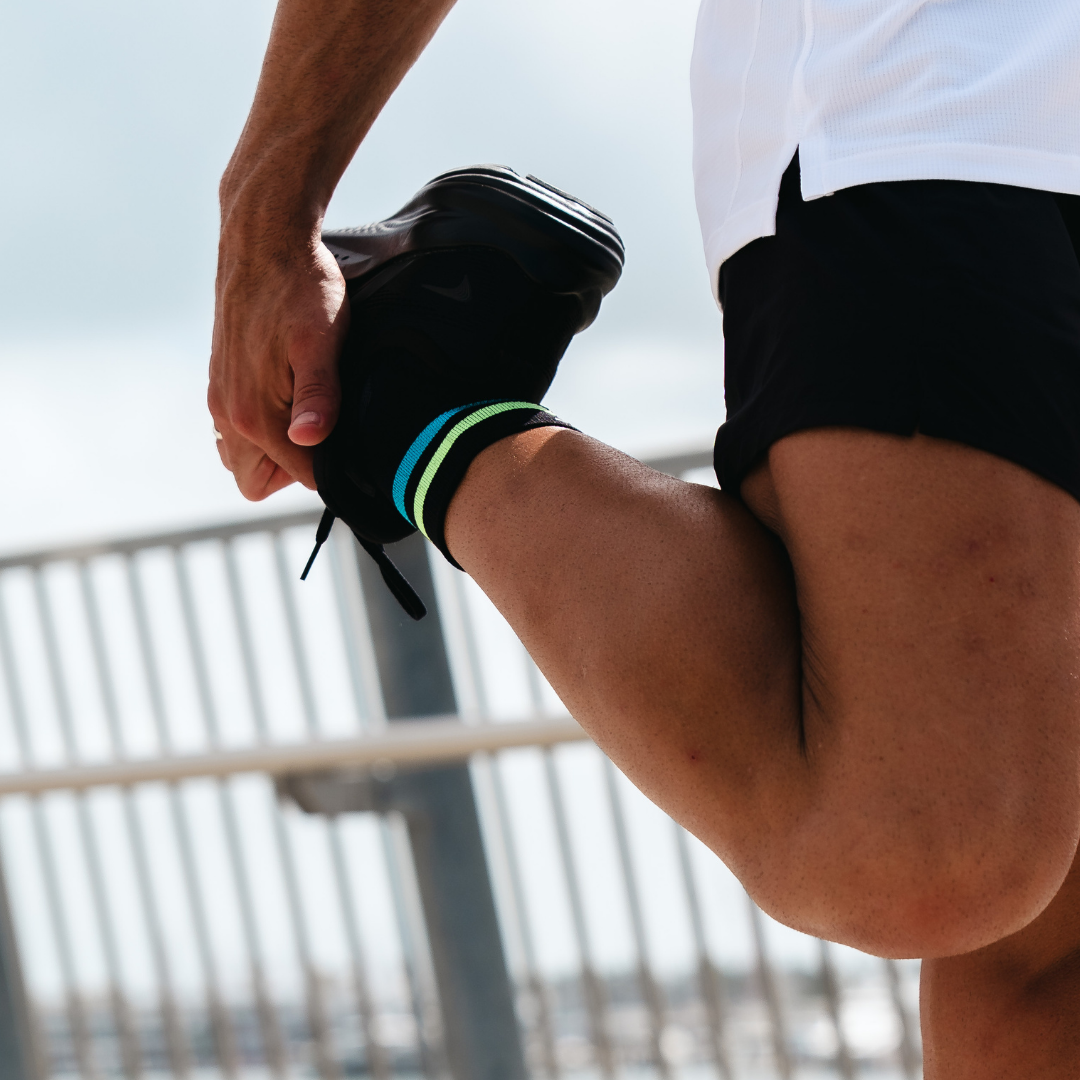Image of person wearing Lightfeet Performance 2 Stripes Black Yellow Aqua Quarter Socks 