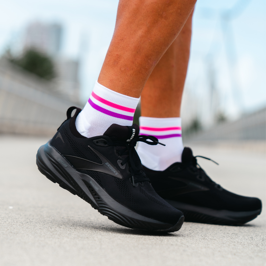 Image of person wearing Lightfeet Performance 2 Stripes White Pink Purple Quarter Socks 
