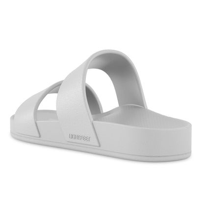 Back angle view of arch contour of the white Lightfeet Double Strap Slide