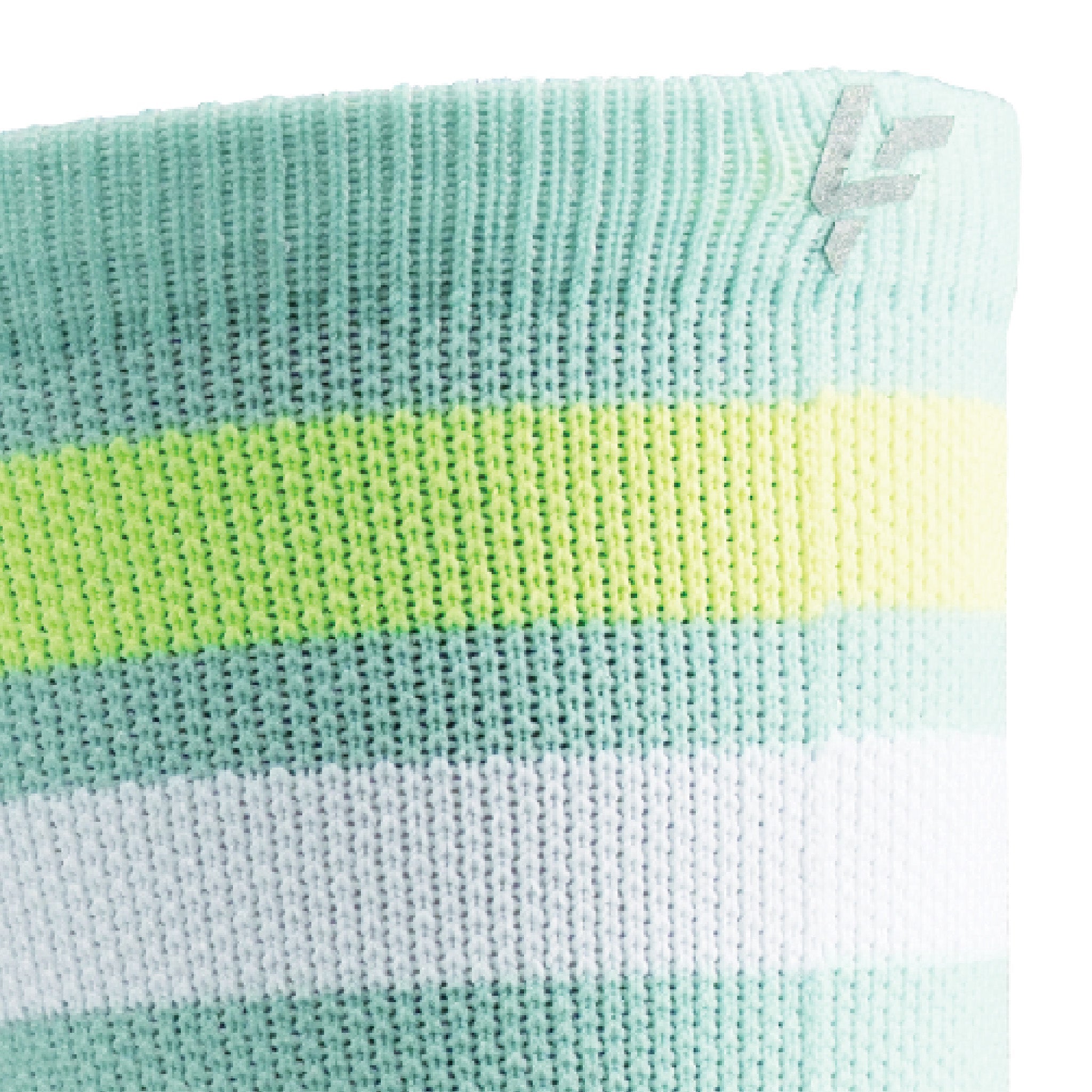 Close up view of reflective print symbol on Lightfeet Performance 2 Stripes Glacier Yellow White Crew Socks 