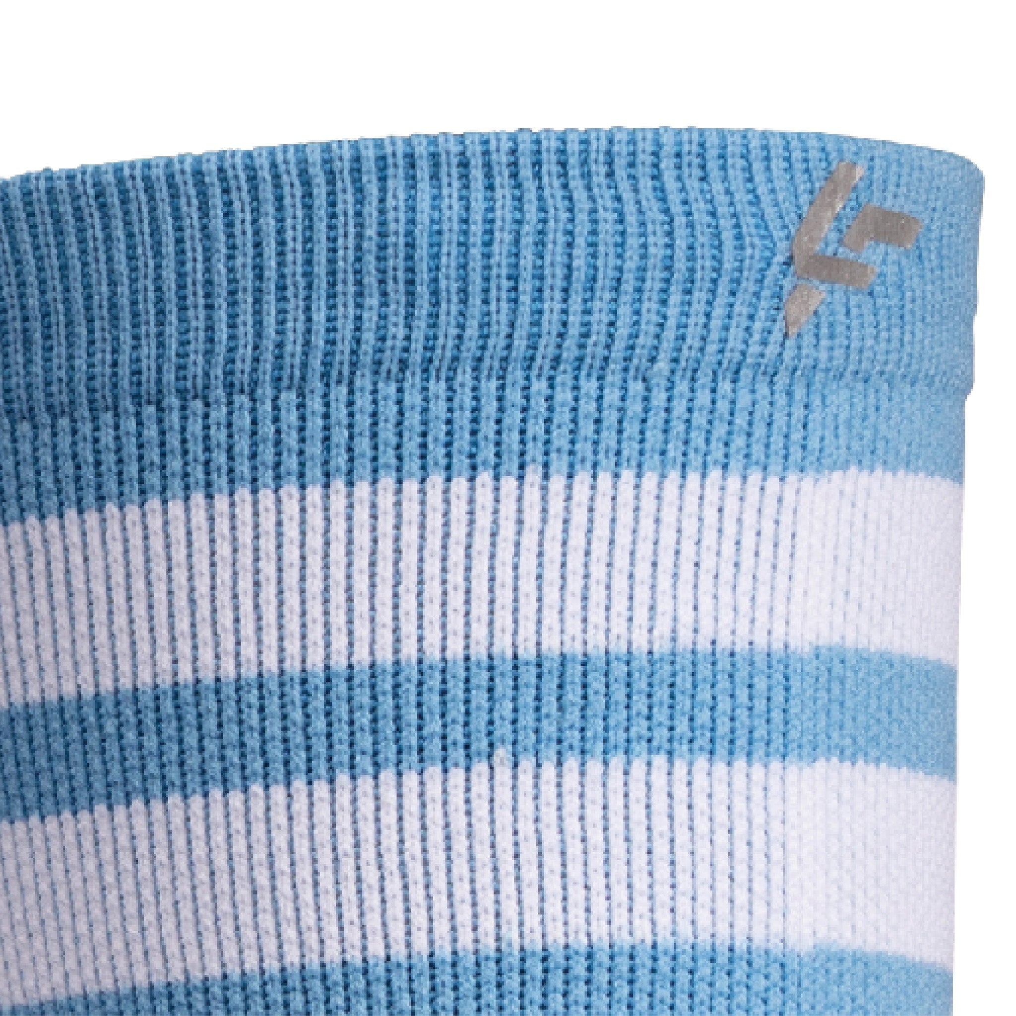 Close up view of reflective print symbol on Lightfeet Performance 2 Stripes Soft Blue Half Crew Sock 