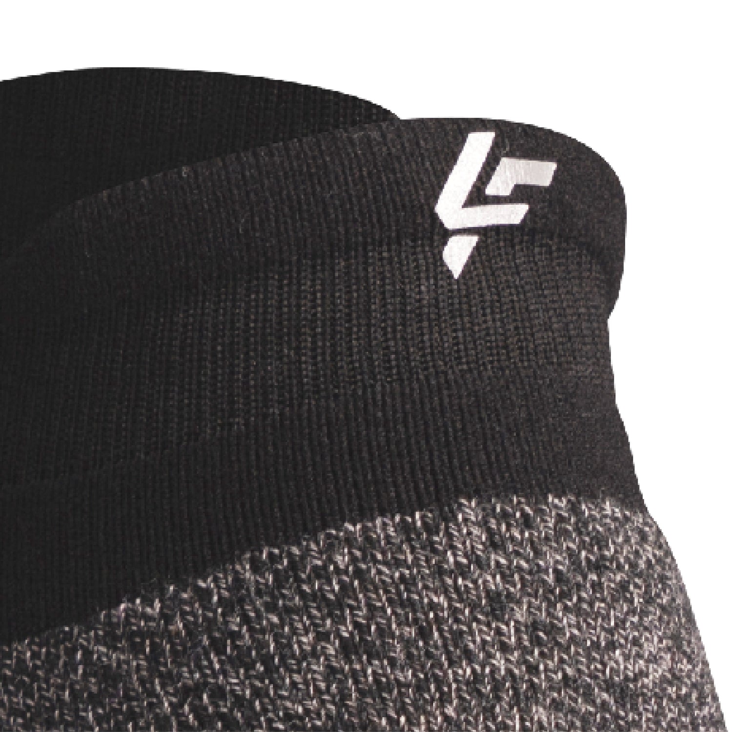 Close up view of reflective symbol on Lightfeet Performance Black Ankle Sock 
