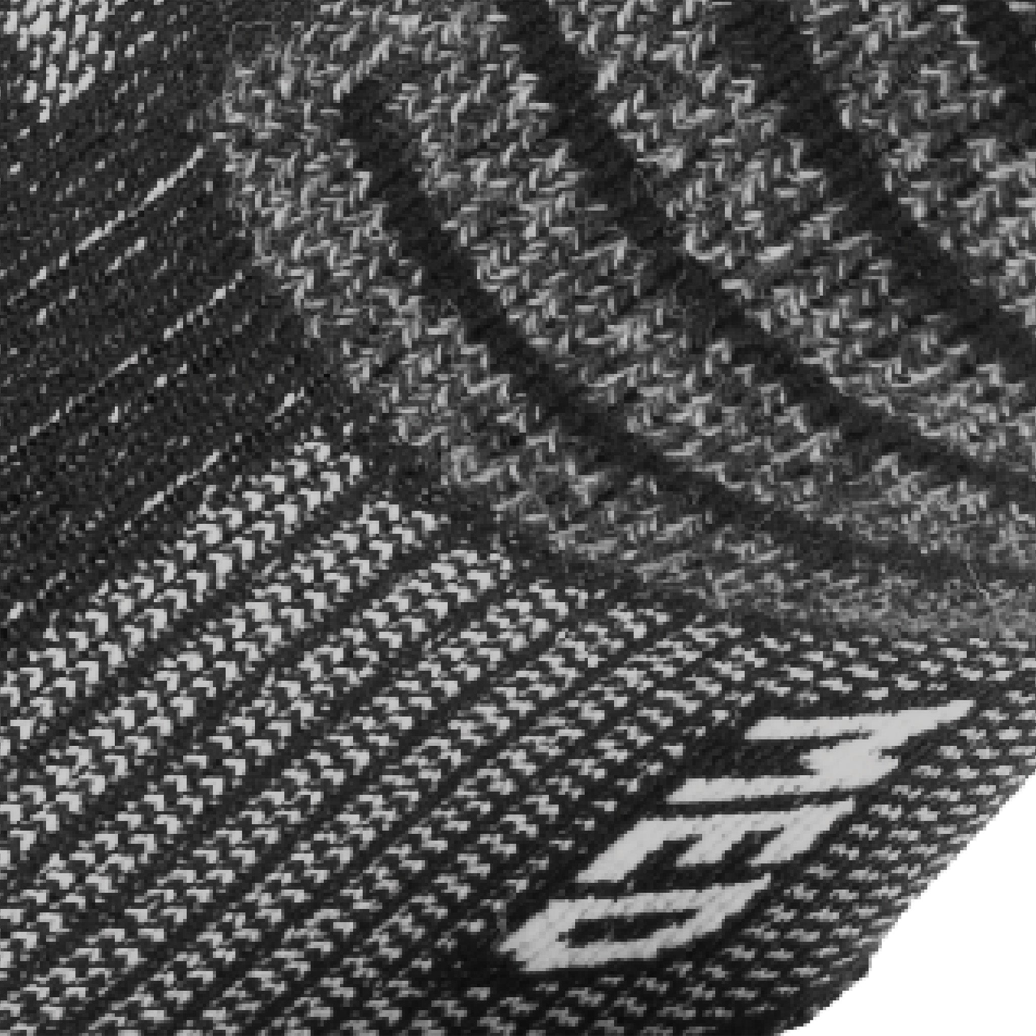 Close up view of elastic arch of Lightfeet Performance Black Half Crew Sock 