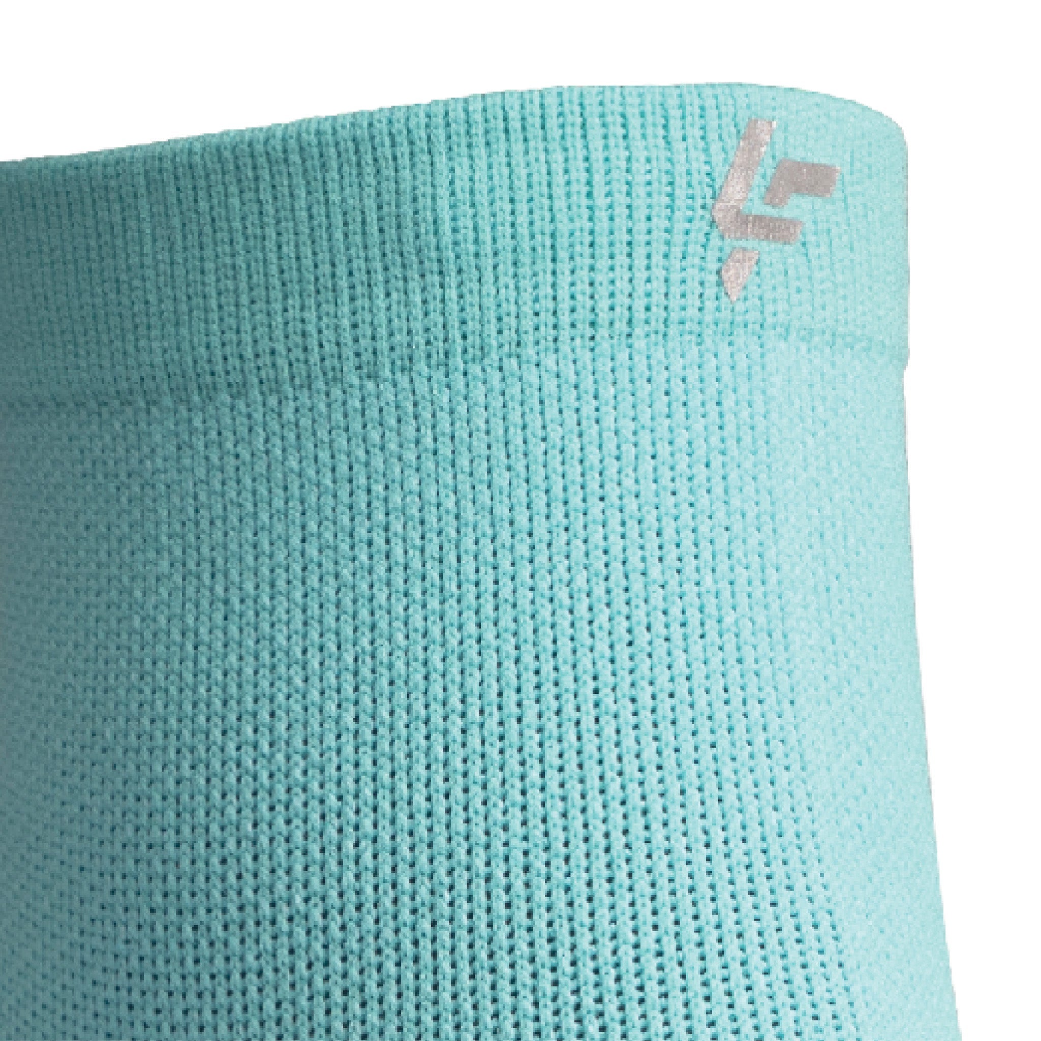 Close up view of reflective symbol on Lightfeet Performance Mint Quarter Crew Sock 