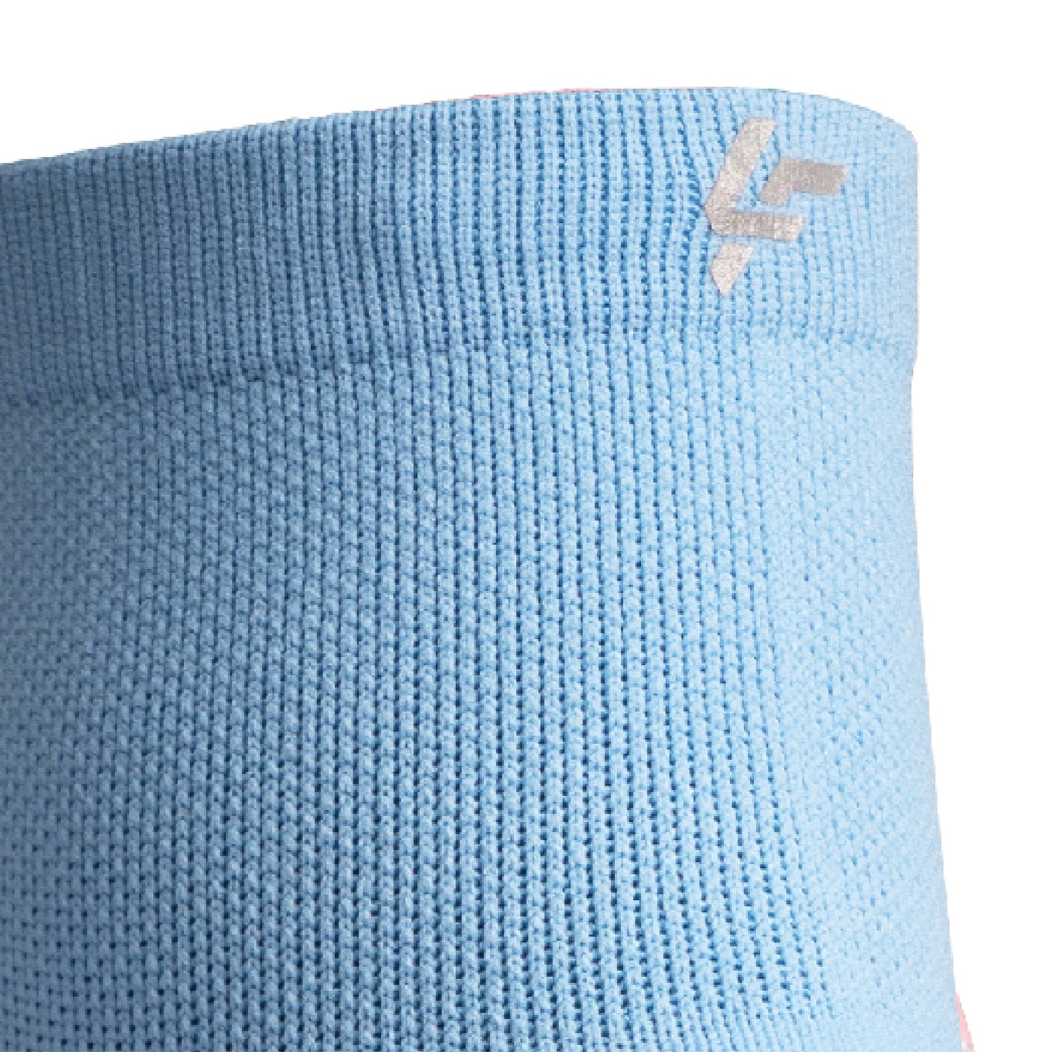 Close up view of reflective symbol on Lightfeet Performance Soft Blue Quarter Crew Sock 