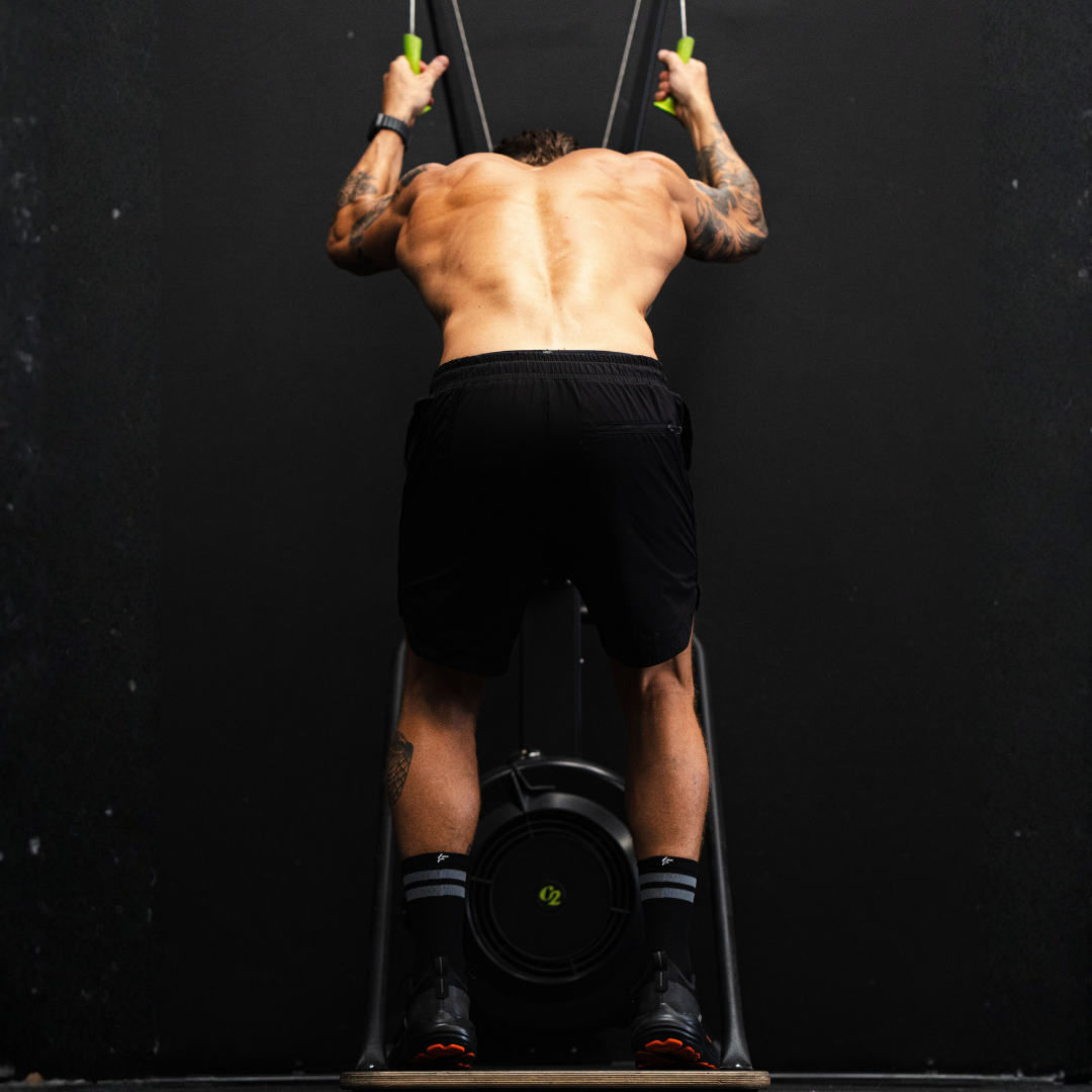 Image of person wearing Lightfeet Performance 2 Stripes Black Half Crew Socks 