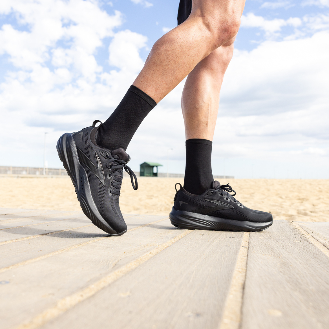 Person wearing Lightfeet Performance Black Half Crew Sock 