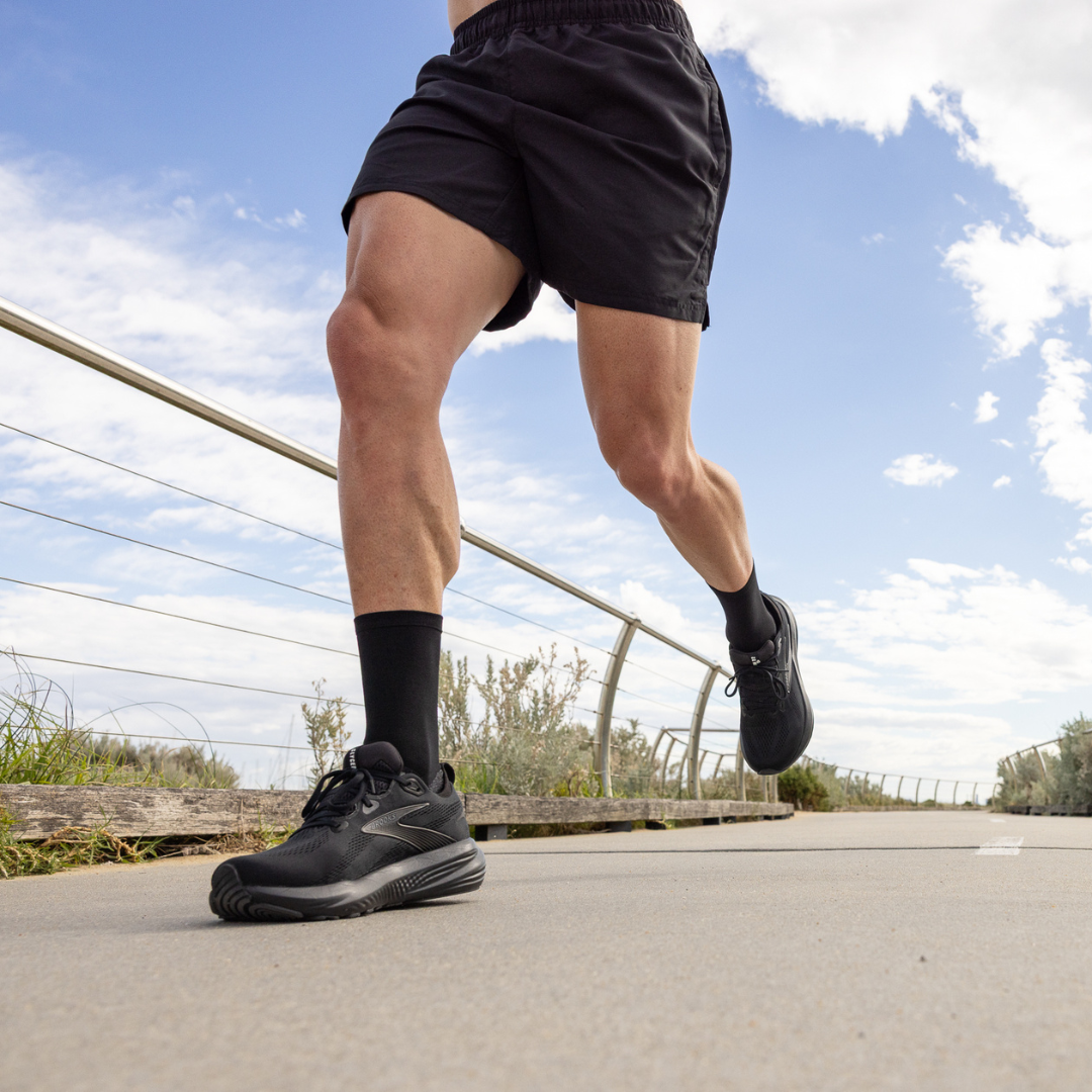 Person wearing Lightfeet Performance Black Half Crew Sock 