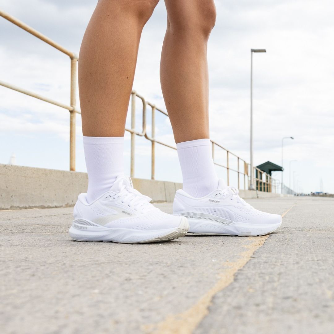 Person wearing Lightfeet Performance White Half Crew Sock 