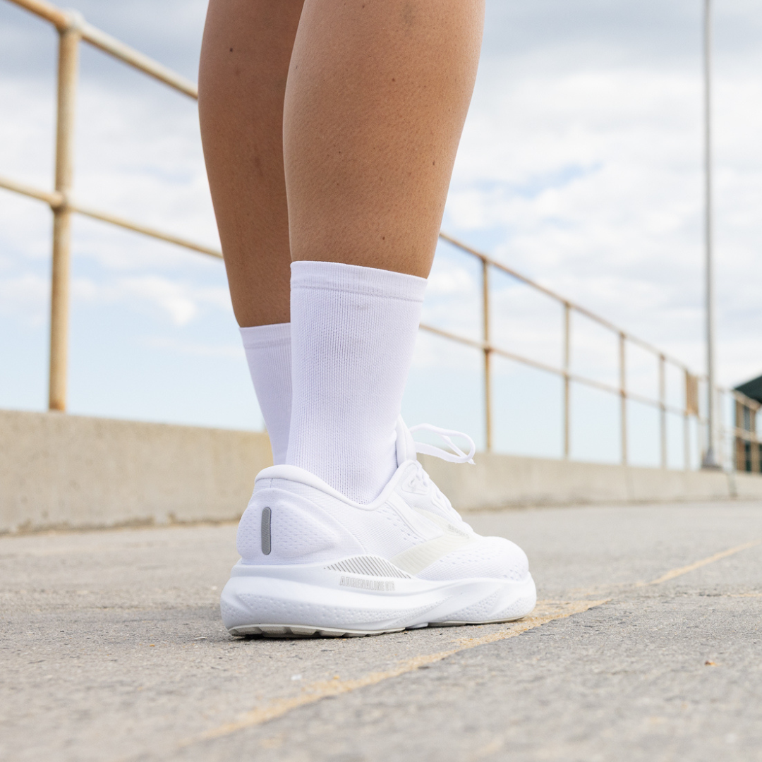 Person wearing Lightfeet Performance White Half Crew Sock 