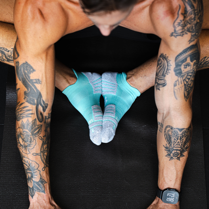 Person wearing Lightfeet Performance Mint Ankle Sock 