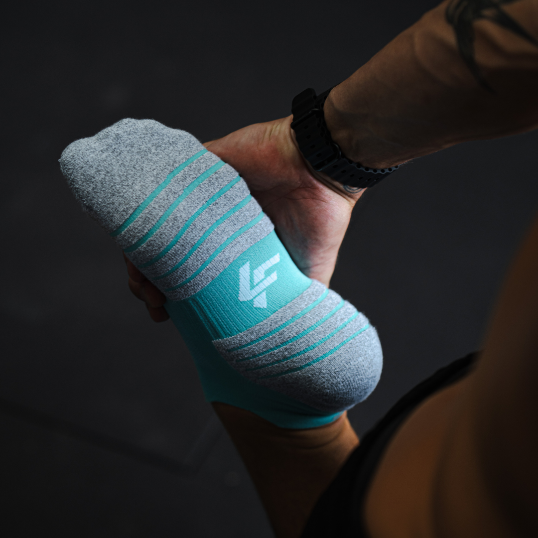 Person wearing Lightfeet Performance Mint Ankle Sock 